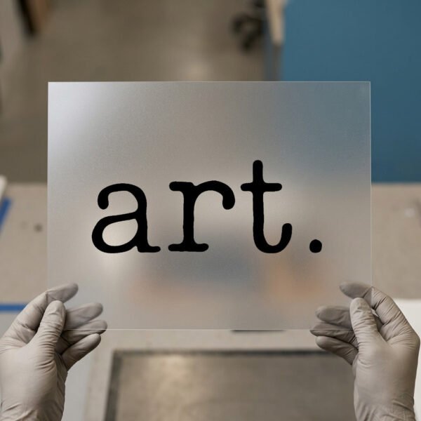 Minimalist 'art.' Word — DTF transfer, dark ink art.